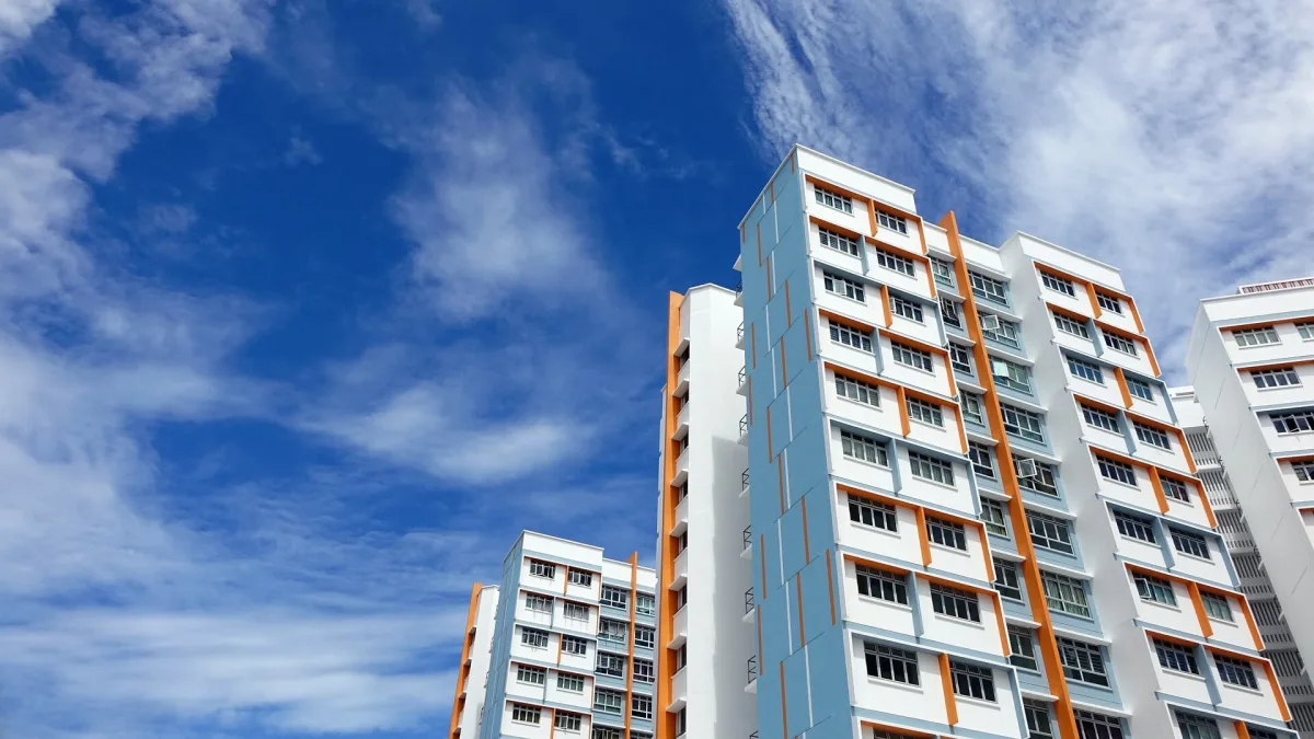 Modern residential buildings featuring orange-accented contemporary design