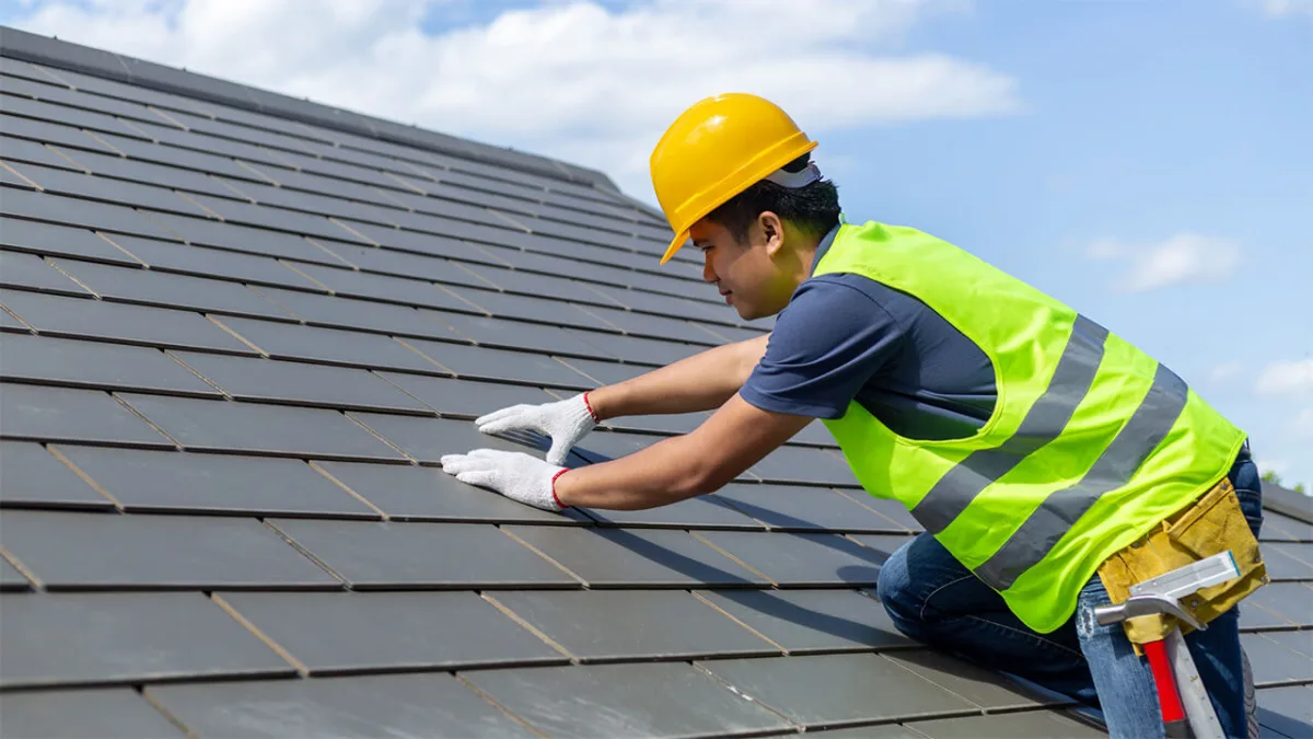 Construction worker on a roof