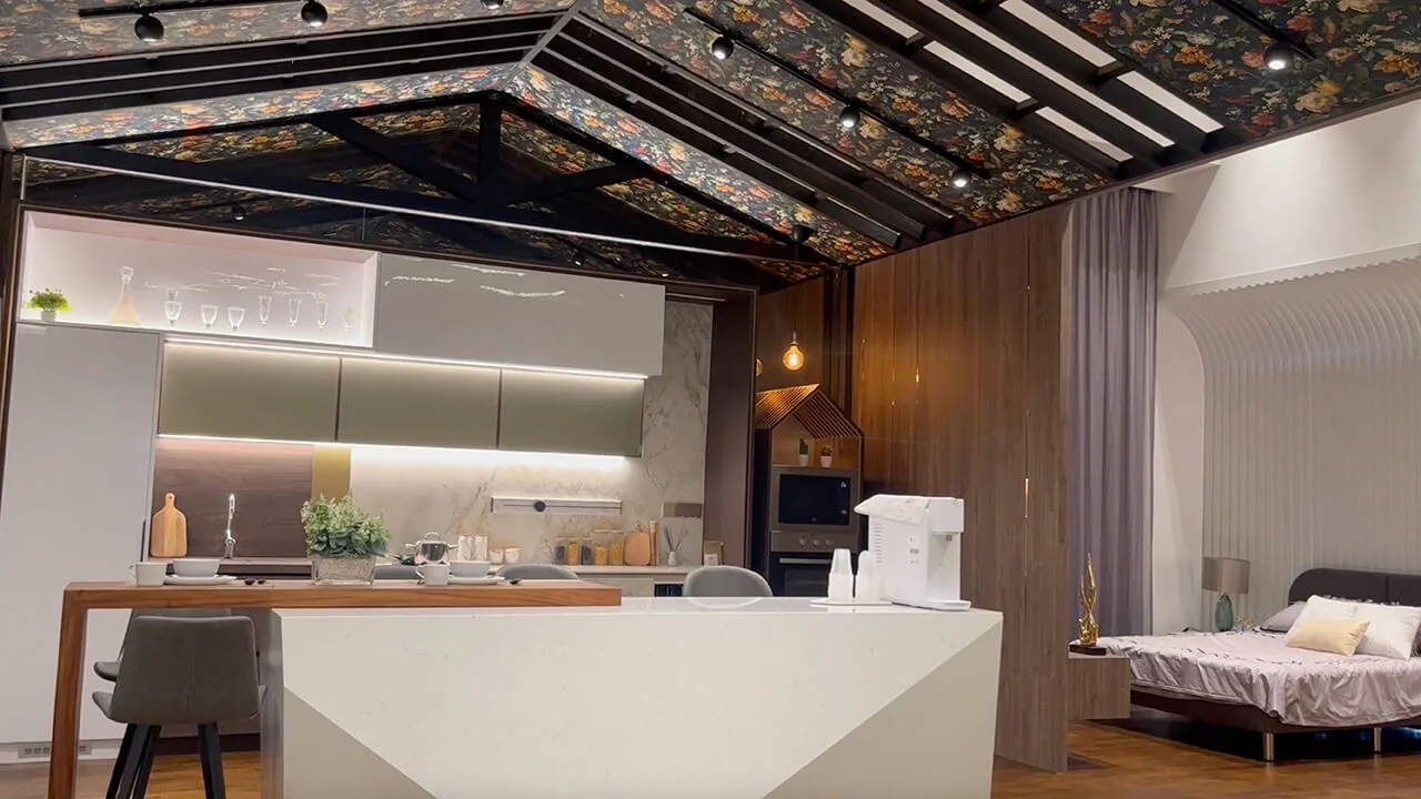 Contemporary residential interior combining kitchen and bedroom with modern finishes