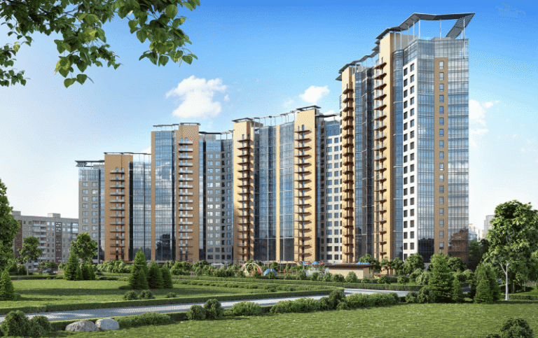 Modern residential towers with green landscaping in urban development project