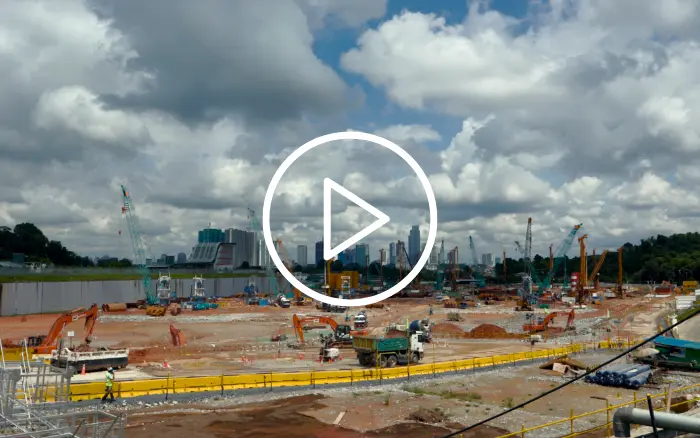 Construction site with excavators and heavy machinery during active excavation work
