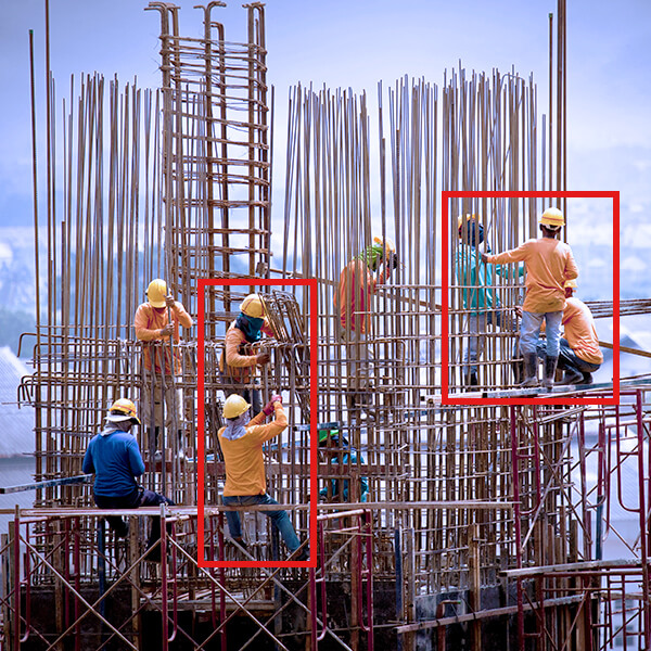 AI safety camera detecting workers on construction site reinforcing steel